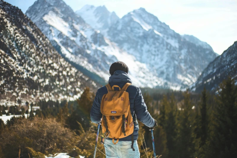a man during a hike taking in nature
